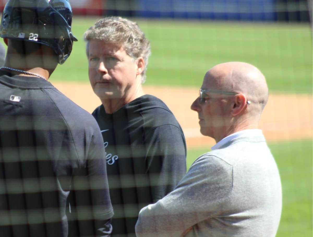 Yankees' owner Hal Steinbrenner and GM Brian Cashman are talking to Juan Soto in an undated photo during the 2024 season.
