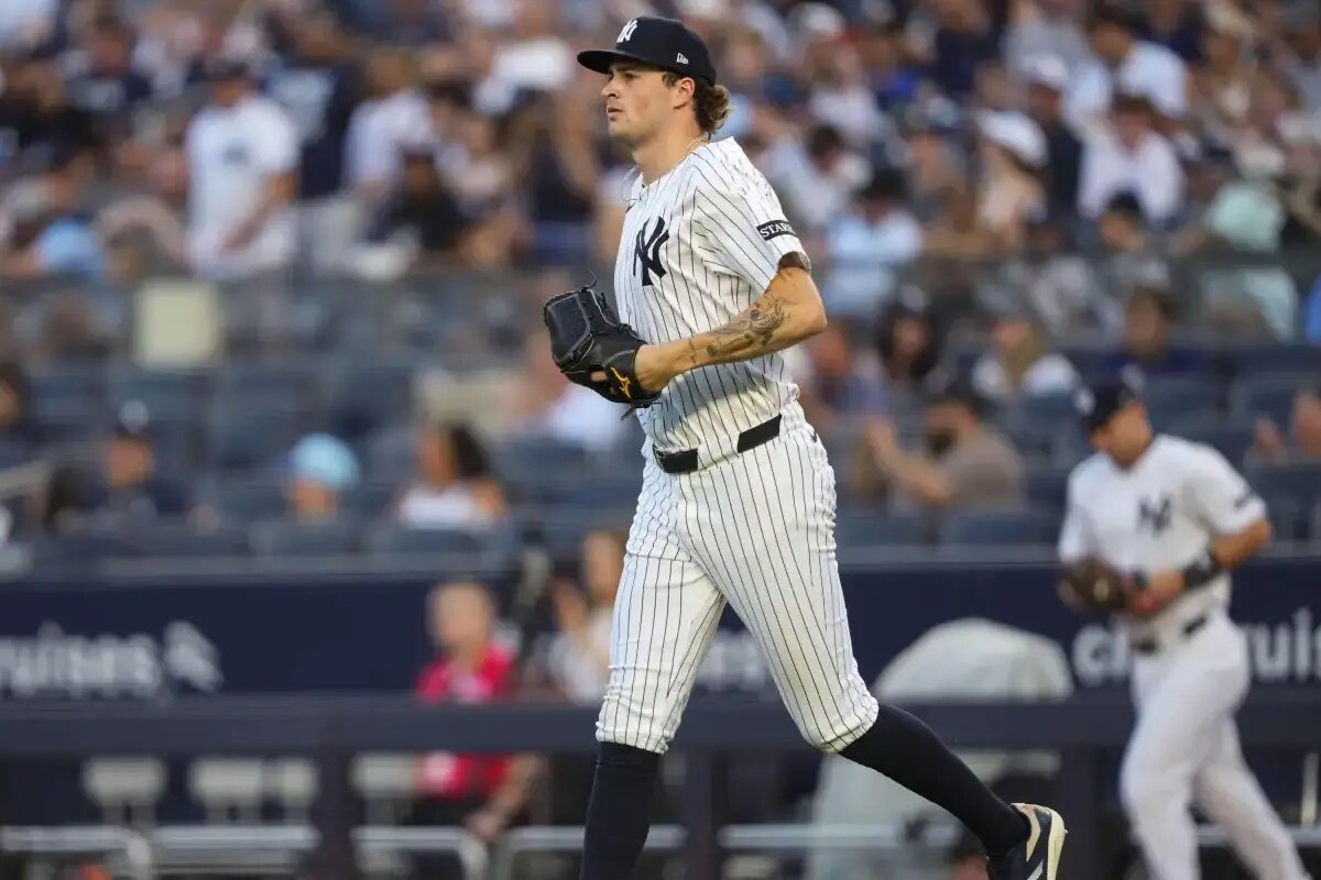 New York Yankees pitcher Cam Schlittler (31) walks onto the field during the first inning of a baseball game against the Seattle Mariners, Wednesday, July 9, 2025, in New York.