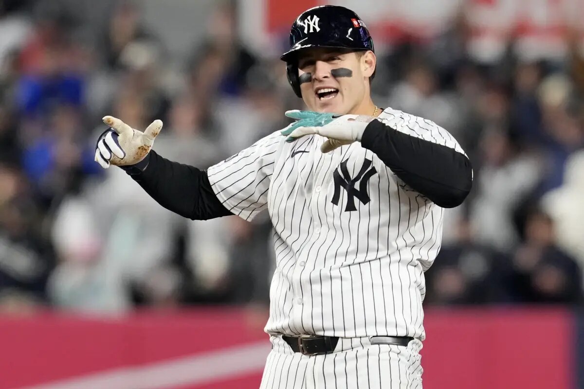 New York Yankees’ Anthony Rizzo celebrates after hitting a RBI double against the Cleveland Guardians during the sixth inning in Game 2 of the baseball AL Championship Series Tuesday, Oct. 15, 2024, in New York.
