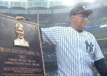 New York Yankees legendary pitcher Mel Stottlemyre is with his plaque at Old-Timers' Day, June 20, 2015, New York.