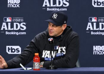Aaron Boone talks to reporters after the Yankees' 4-3 ALDS loss to the Rays, New York, October 7, 2026.
