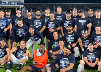 The Yankees at group photo session after 9-2 rout of the Red Sox to win Wild Card Series at Yankee Stadium, New York, September 30, 2026.